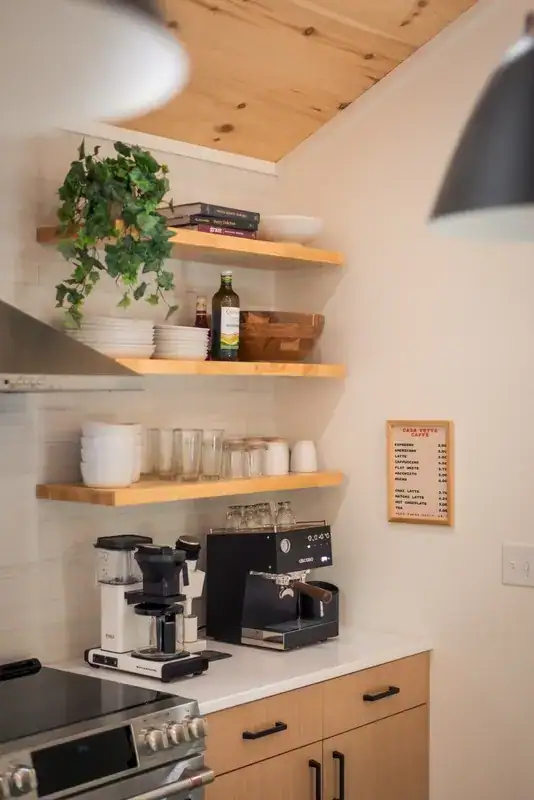 Coffee station with open shelves and mugs
